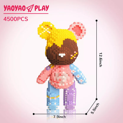A stylized yellow ​​Brick Bear toy​​ with brown facial pixels, pink ear accents, and floral-patterned torso, labeled "4500PCS" and "12.6inch