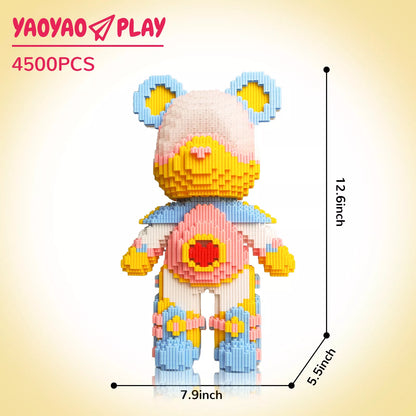 A ​​Brick Bear toy​​ with light pink head, blue/yellow ears, red heart torso, and labeled dimensions (12.6" height) on a neutral backdrop