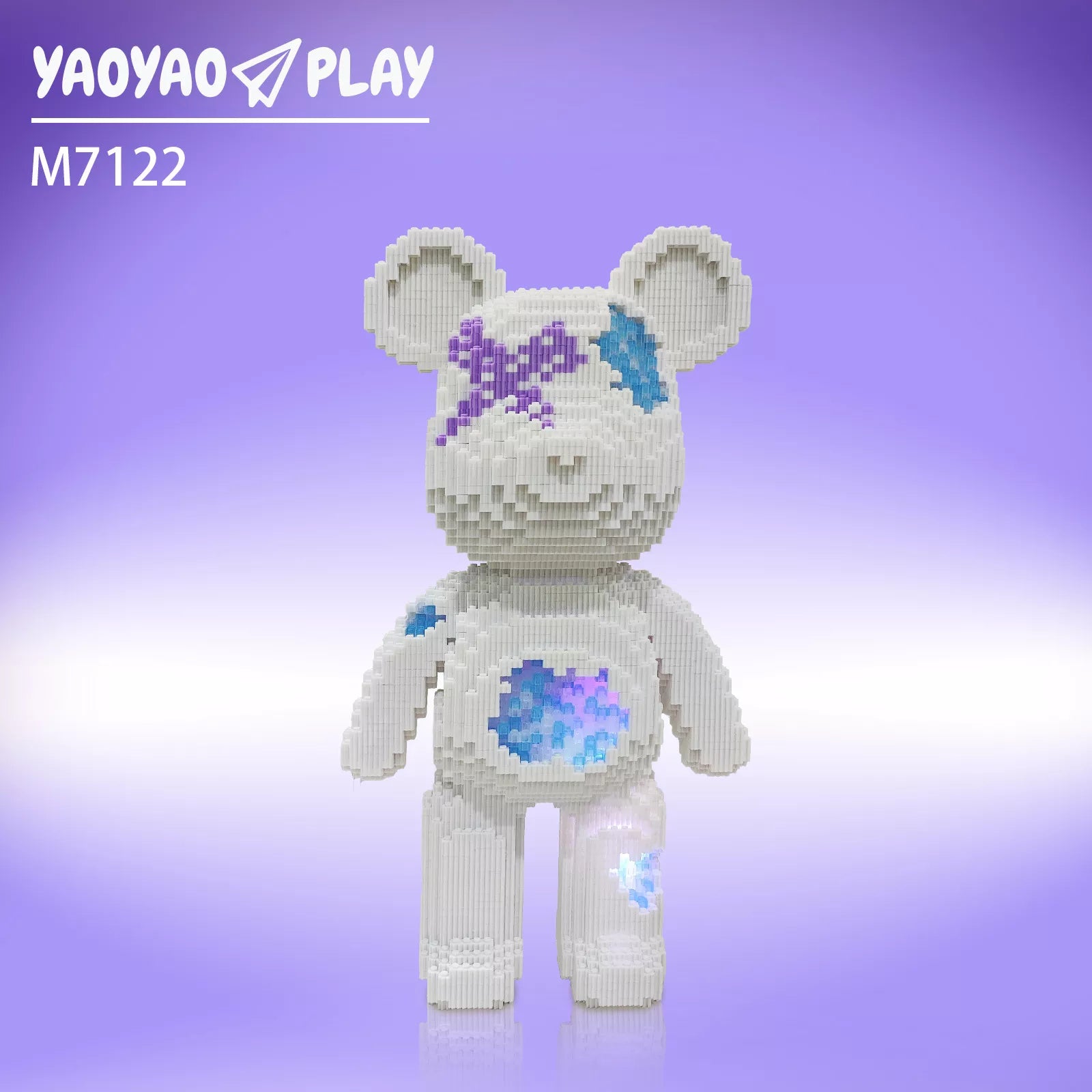 A white ​​Brick Bear toy​​ with purple-blue accents labeled "M7122" against a gradient backdrop.