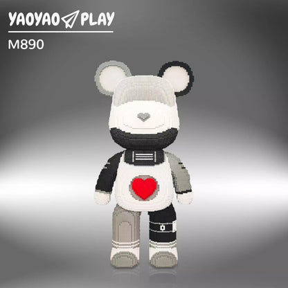 Monochrome ​​Brick Bear toy​​ with red heart and mechanical details against a gradient gray backdrop.