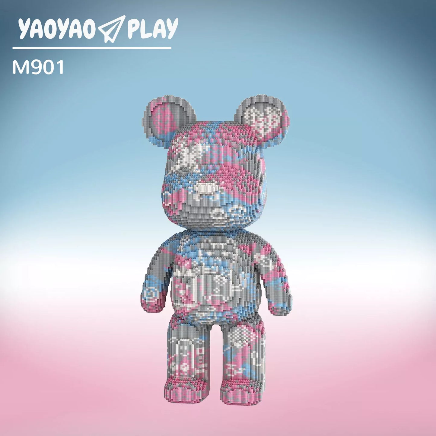 A ​​Brick Bear toy​​ (Model M901) with gray mosaic patterns and magenta/blue accents, set against a sky-blue-to-pink gradient.